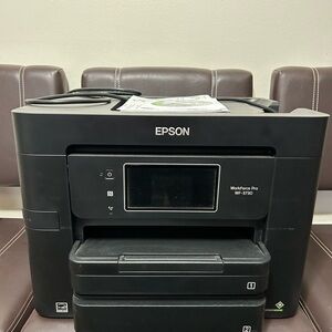 Canon inkjet printer; copy/scan/fax capabilities; color & black/white printing